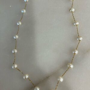 Elegant Pearl Necklace with Gold Accents
